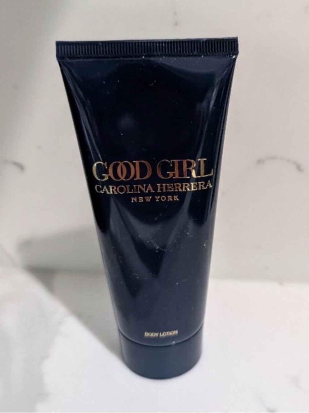 Carolina Herrera Good Girl Body Lotion - Navy Blue with Gold Lettering